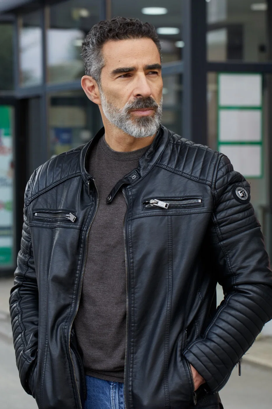 Georgios wearing a leather jacket